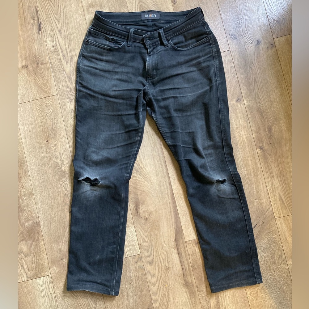 Well-worn black denim performance jeans
